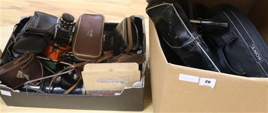 A large collection of cameras and equipment